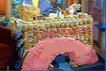 A TABLE MADE OUT OF DONCAN DONUTS FOR THE ROSIE SHOW